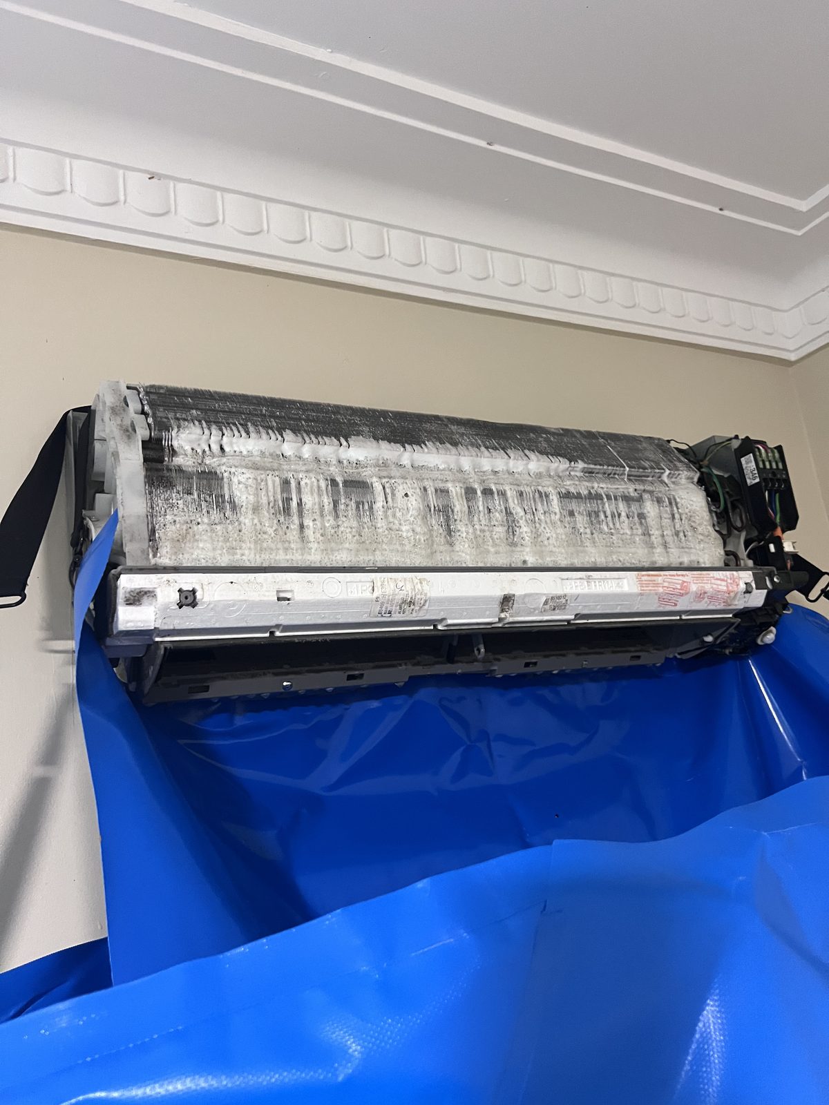 A split system mid hygiene clean with the cover removed