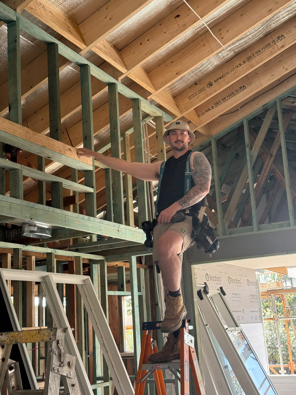 An East Coast Air Conditioning team member on site during a new-build installation